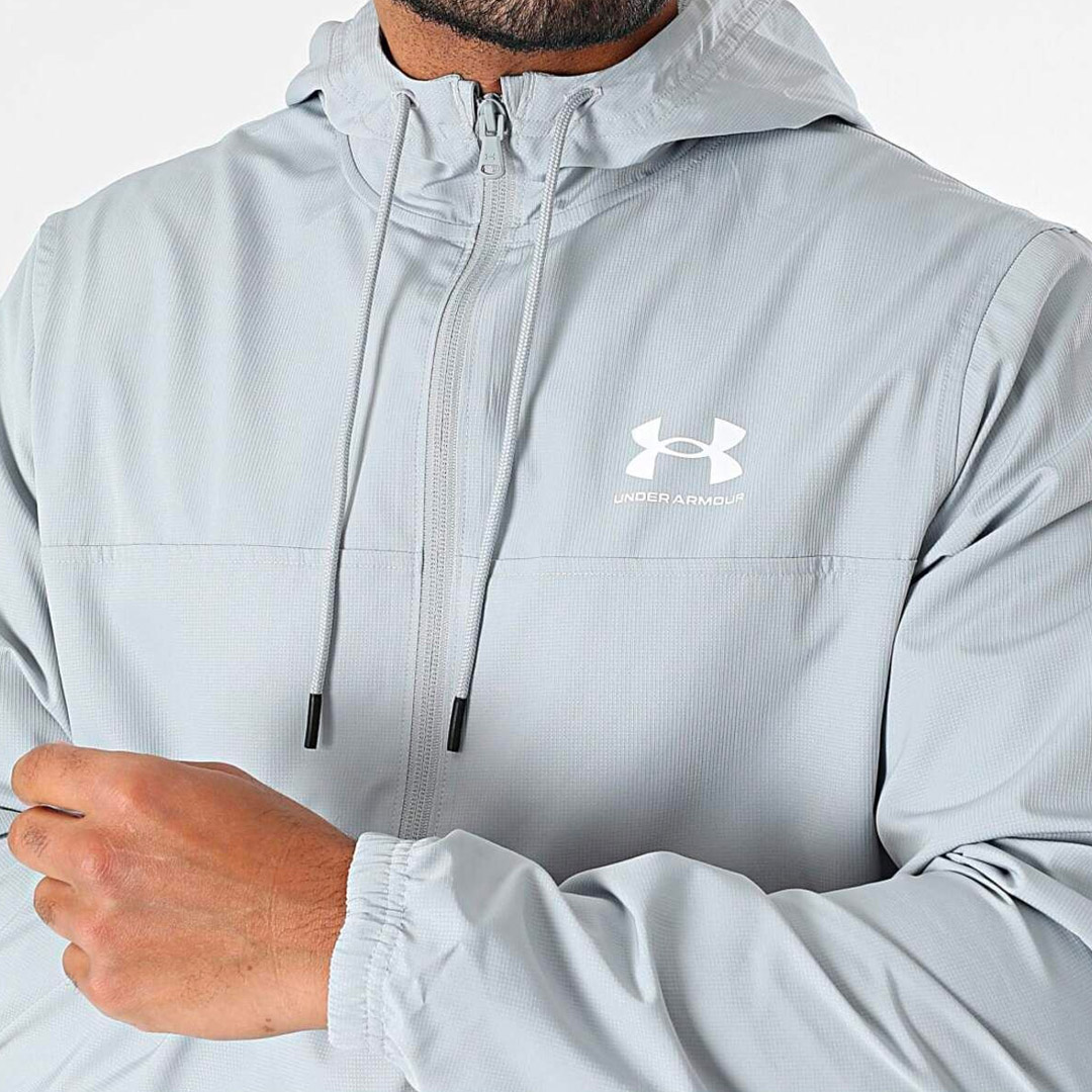 UNDER ARMOUR RIVAL WVN WINDBREAKER 1390149-011 Grey